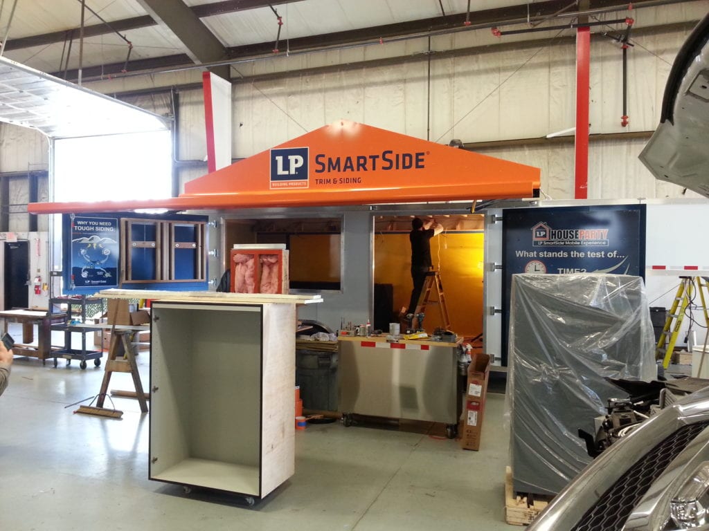 Front view of orange station for LP's Mobile Experience event